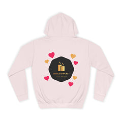 Pink hoodie with a logo and text on the back against a white background