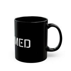 Black mug with white text on a white background