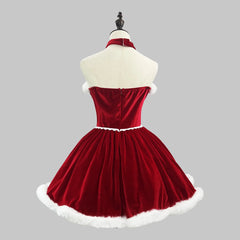 Red velvet dress with white trim on a mannequin against a gray background