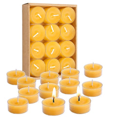 Set of yellow candles with a cardboard box packaging on a white background
