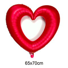 Red heart-shaped balloon on a white background