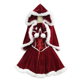 Red velvet dress with white fur trim on a white background