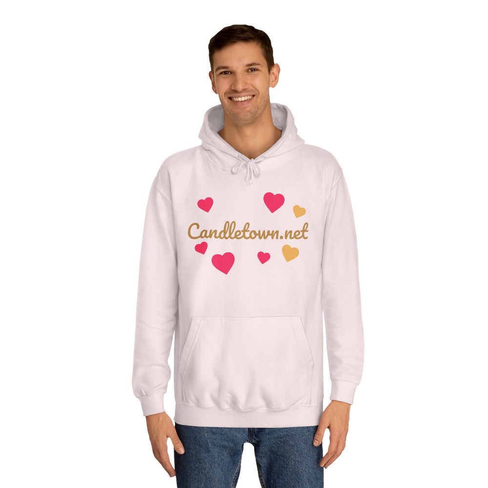 Person wearing a white hoodie with colorful heart designs and 'Candletown.net' text on a white background