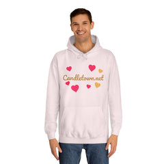 Person wearing a white hoodie with colorful heart designs and 'Candletown.net' text on a white background