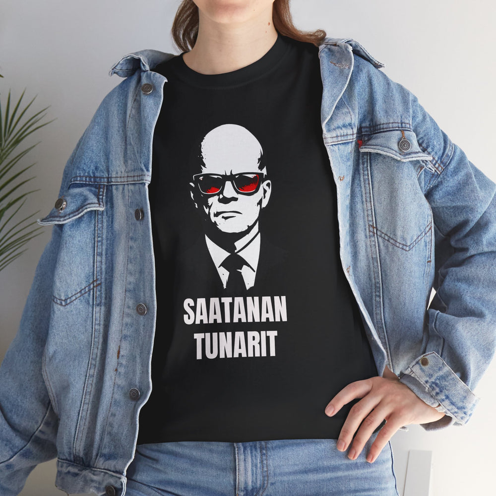 Person wearing a black t-shirt with a graphic design and text, paired with a denim jacket.