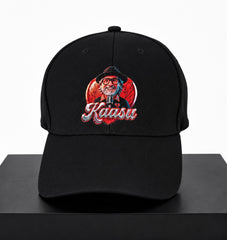 Black cap with embroidered design and 'Kaasu' text on a white background