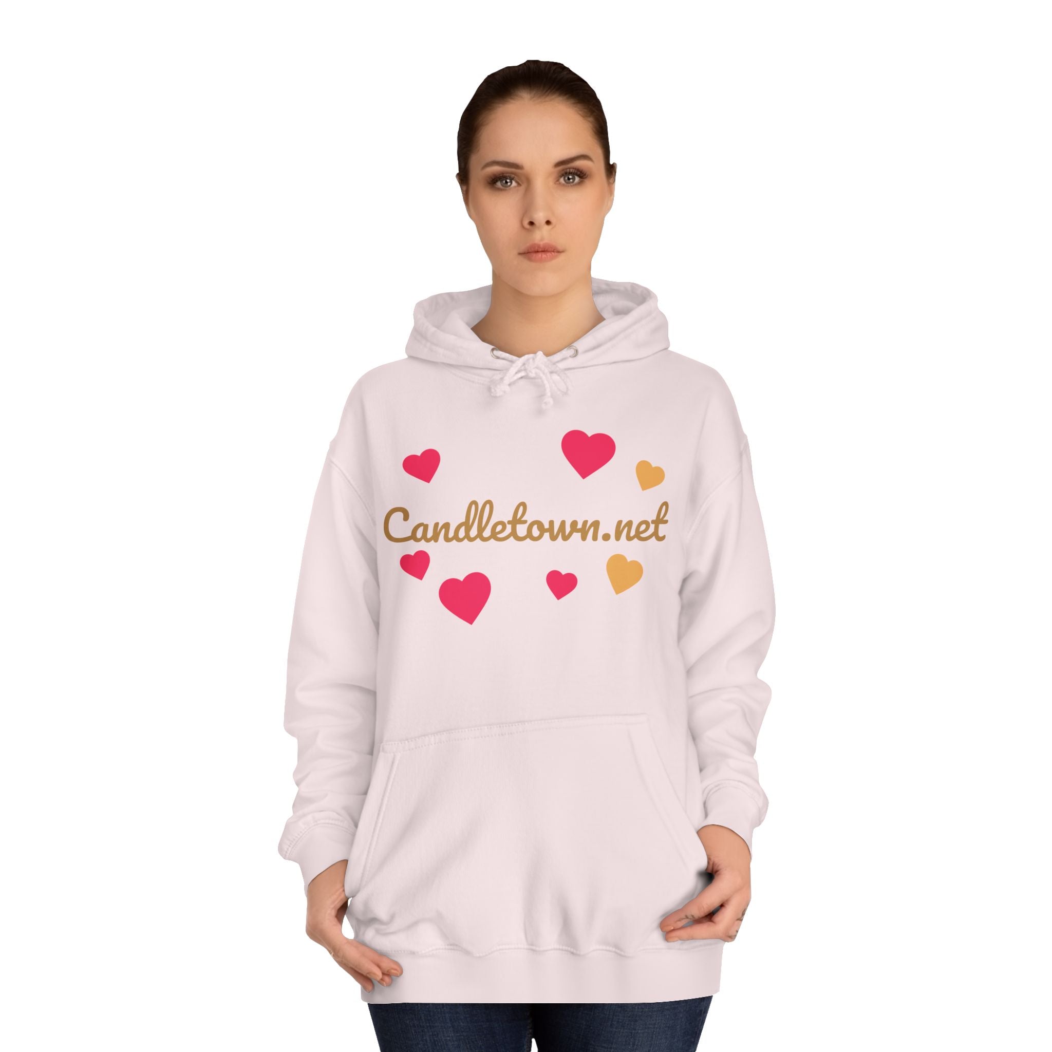 Woman wearing a light pink hoodie with heart designs and 'Candletown.net' text on a white background