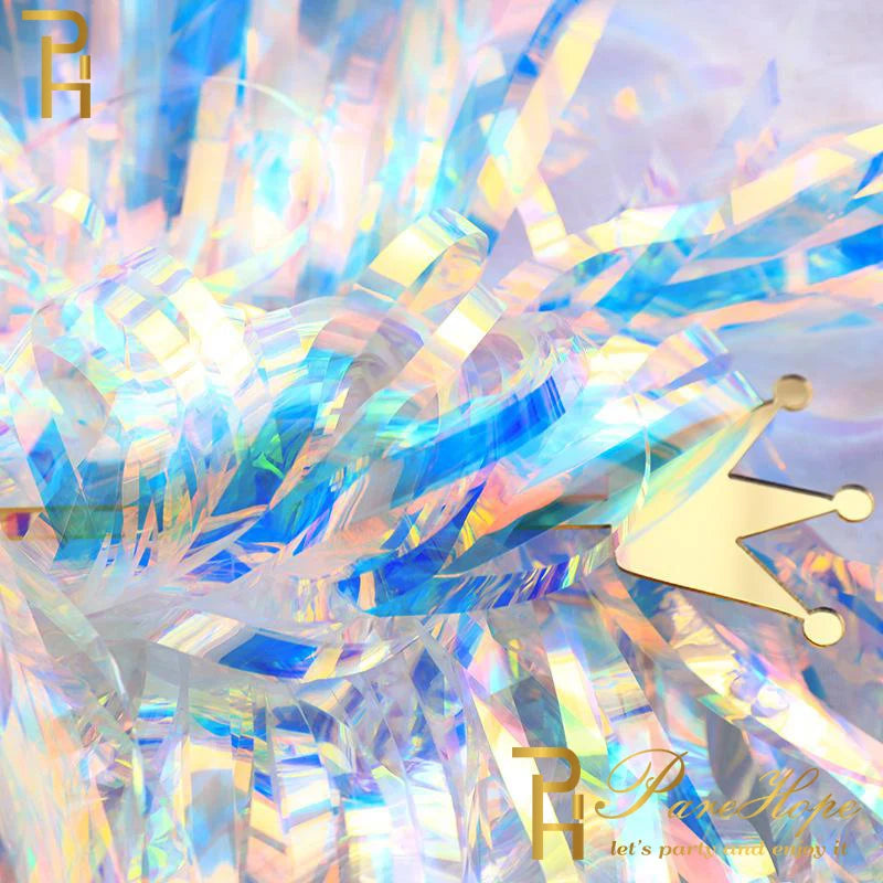 Holographic tinsel with a gold crown and brand logo on a multicolored background