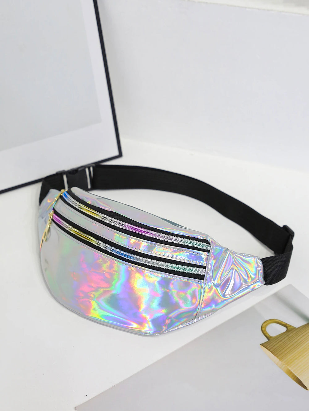 Holographic fanny pack on a white background