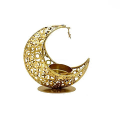 Gold decorative moon-shaped candle holder on a white background