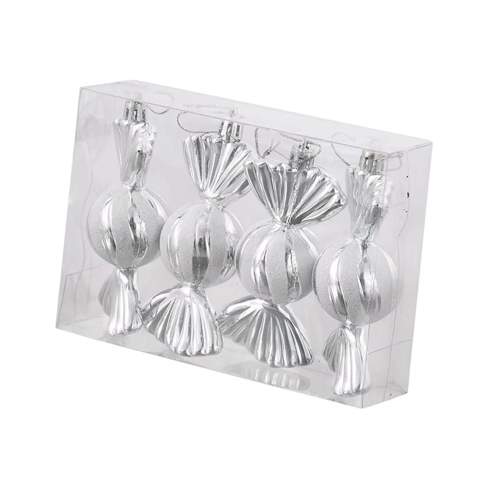 Set of silver Christmas ornaments in a clear packaging box on a white background