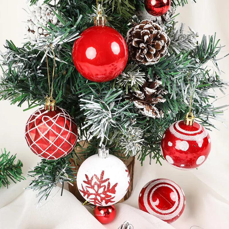 Decorative Christmas tree with red and white ornaments and pine cones.