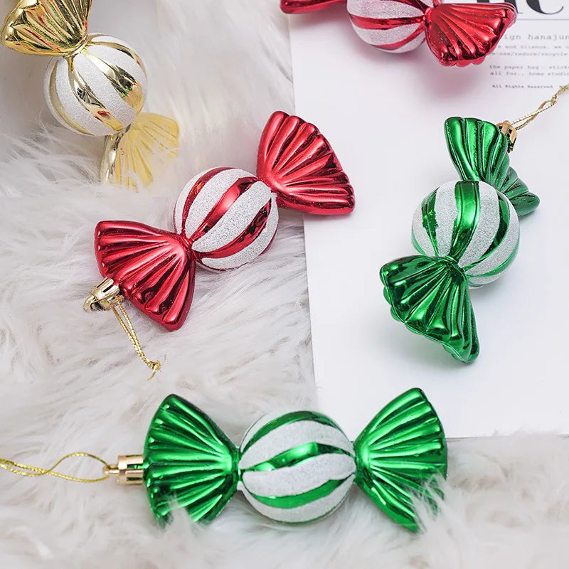 Decorative candy ornaments in red, green, and gold on a soft white background.