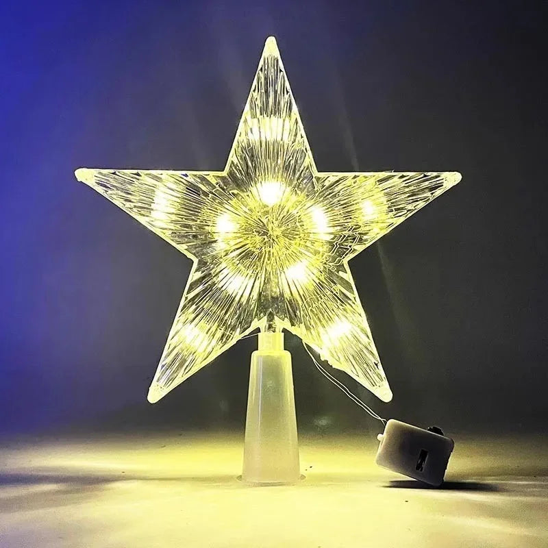 Star-shaped light fixture with a power adapter on a dark background