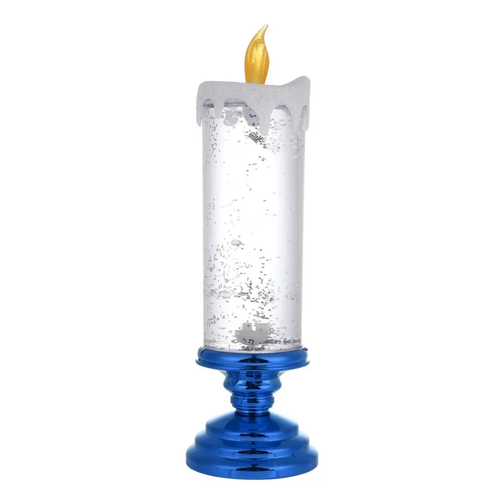 Decorative candle with blue base and clear glass holder on a white background